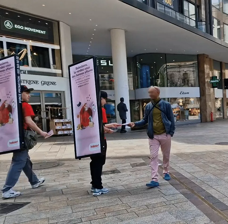 Street marketing campaign deployed in the shopping streets of Geneva to promote Balexert, with distribution and interaction with passers-by.
