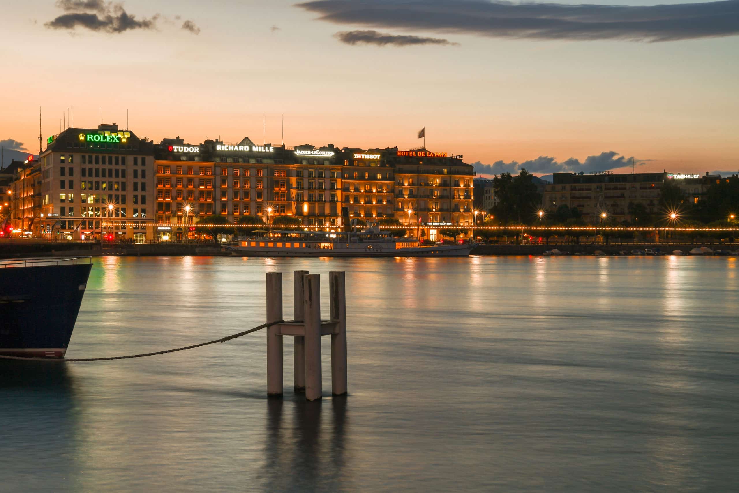 Panoramic view of buildings with connected illuminated signs that can be controlled remotely via a mobile app