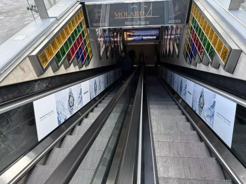 Advertising for Mont-Blanc watches in the escalators of the Mont-Blanc car park, Molard entrance Geneva