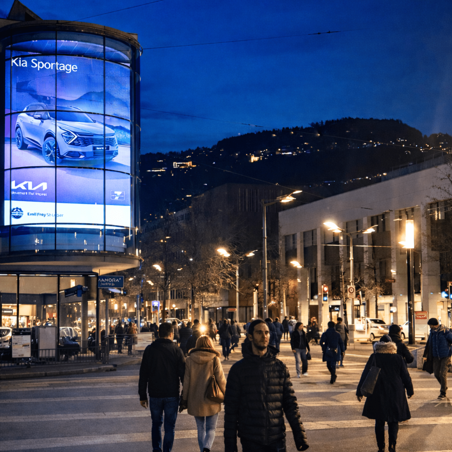 Mégascreen publicitaire situé à Vevey diffusant une annonce pour Emil Frey Saint-Légier, visible dans un environnement urbain à forte fréquentation.
