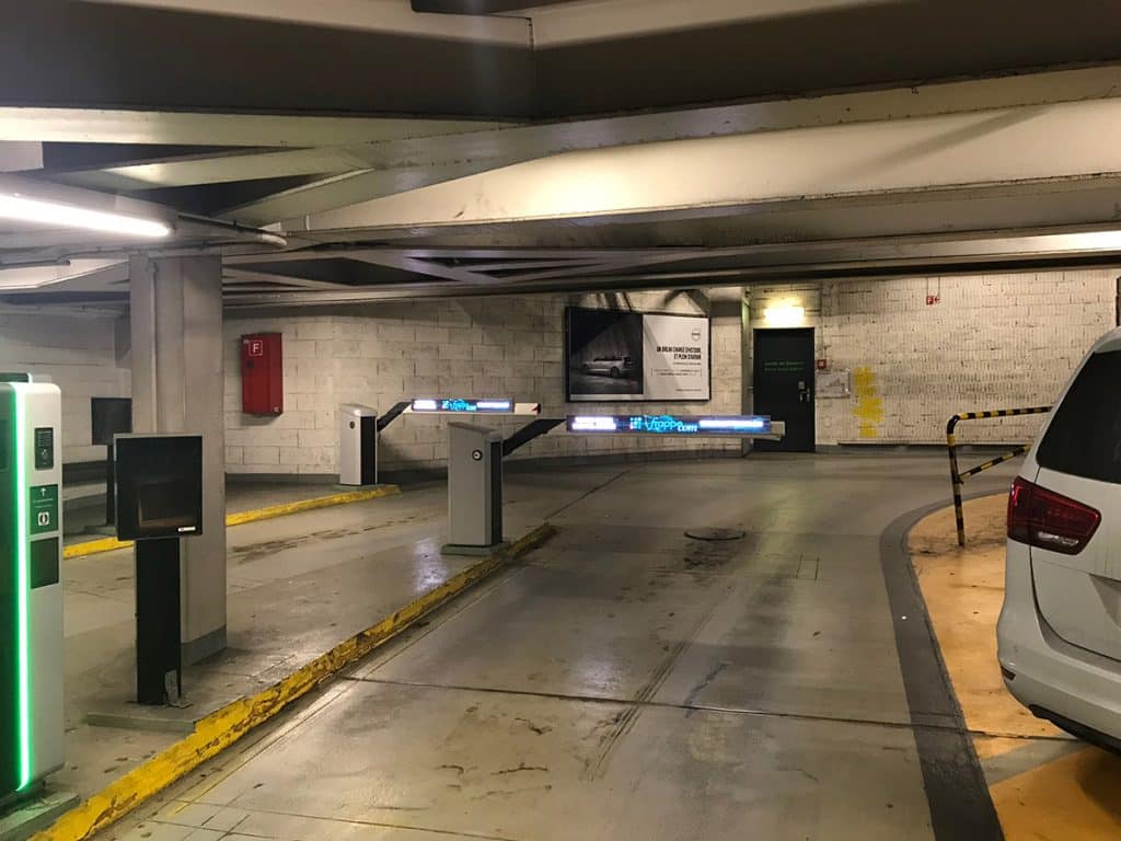 Digital advertising screens integrated into the automatic barriers of Manor Parking in Geneva, ensuring strong and innovative advertising impact
